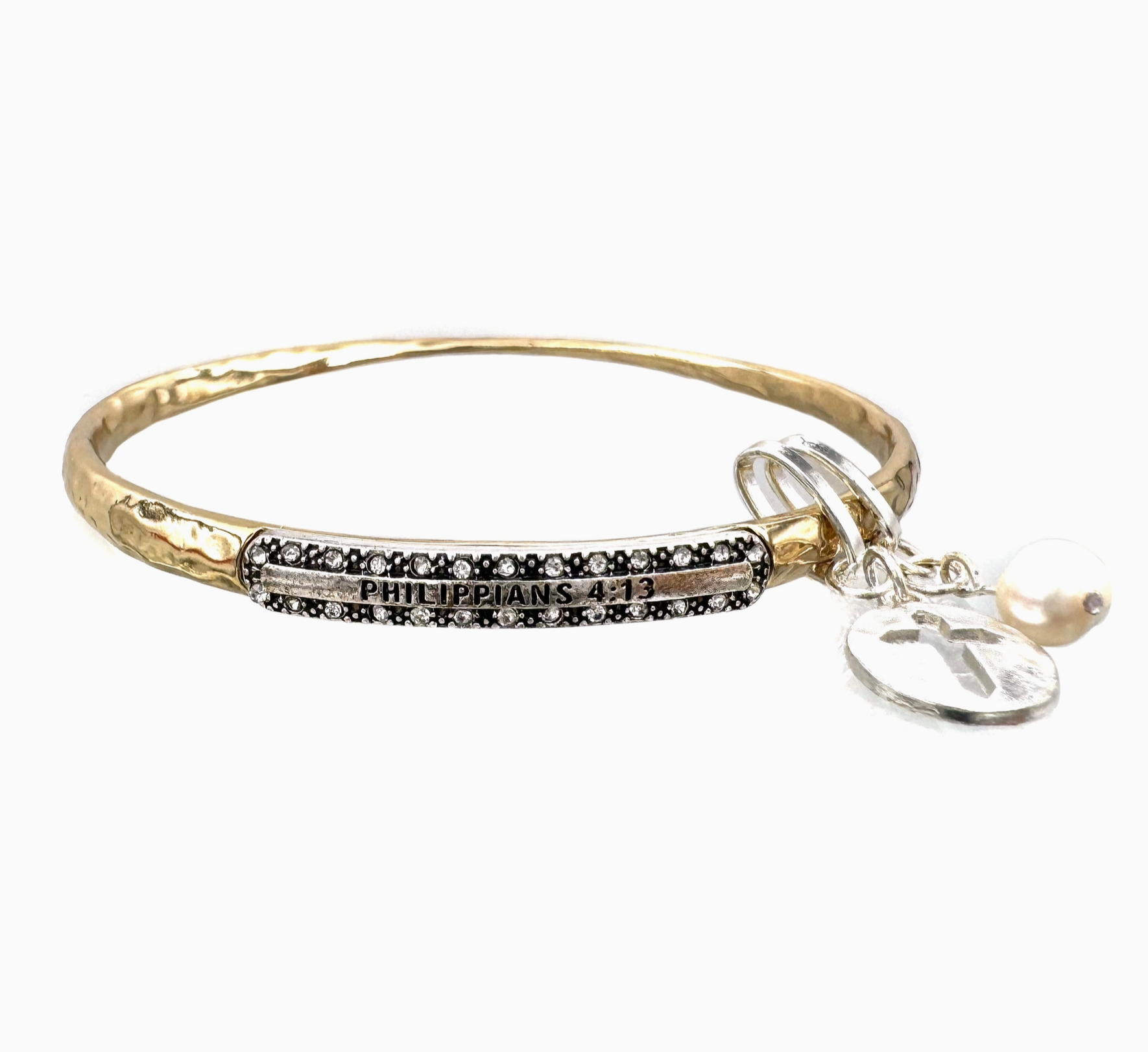 Gold bracelet with black beaded bar and cross charm on a white background